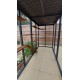 Waterproof Four-Sided Catio cat enclosure painted black with large shelves pack